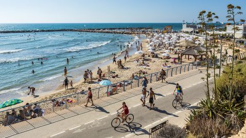 Beach culture and bike culture have a happy meeting in Tel Aviv. This is Hilton Beach.