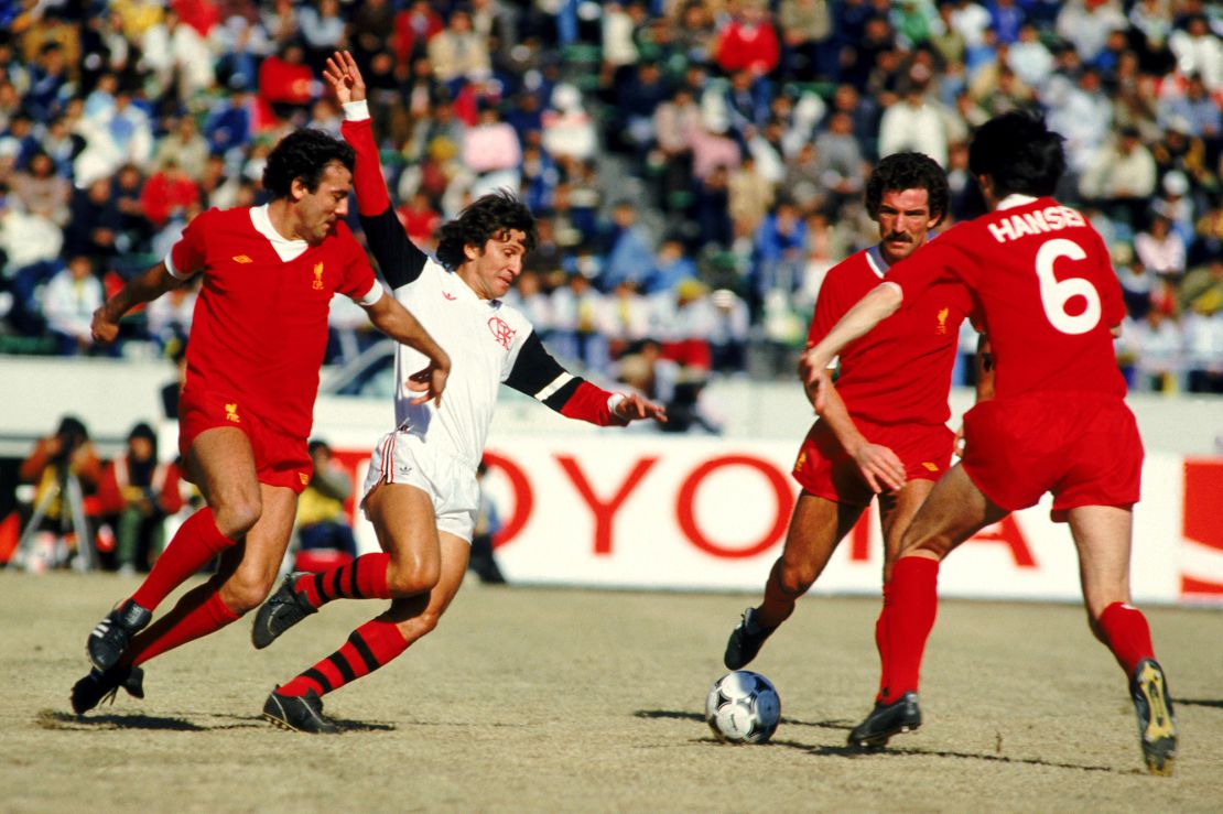 Flamengo's Zico takes on Liverpool's  Ray Kennedy, Graeme Souness and Alan Hansen.