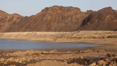 The sun sets on the shrinking Lake Mead in April 2022, where water has declined to levels not seen since the reservoir was filled after the construction of Hoover Dam.