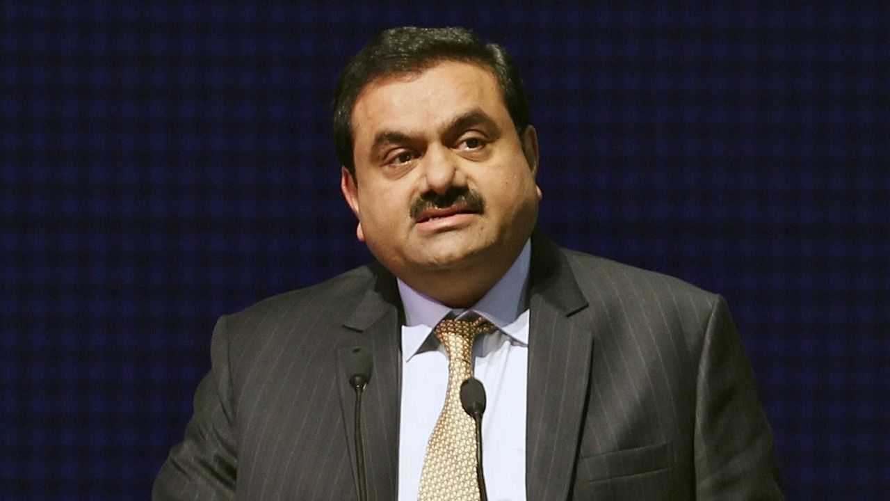 Adani Group Chairman and founder Gautam Adani addresses a gathering during the concluding ceremony of the Vibrant Gujarat Summit in Gandhinagar in the western Indian state of Gujarat January 12, 2015. 