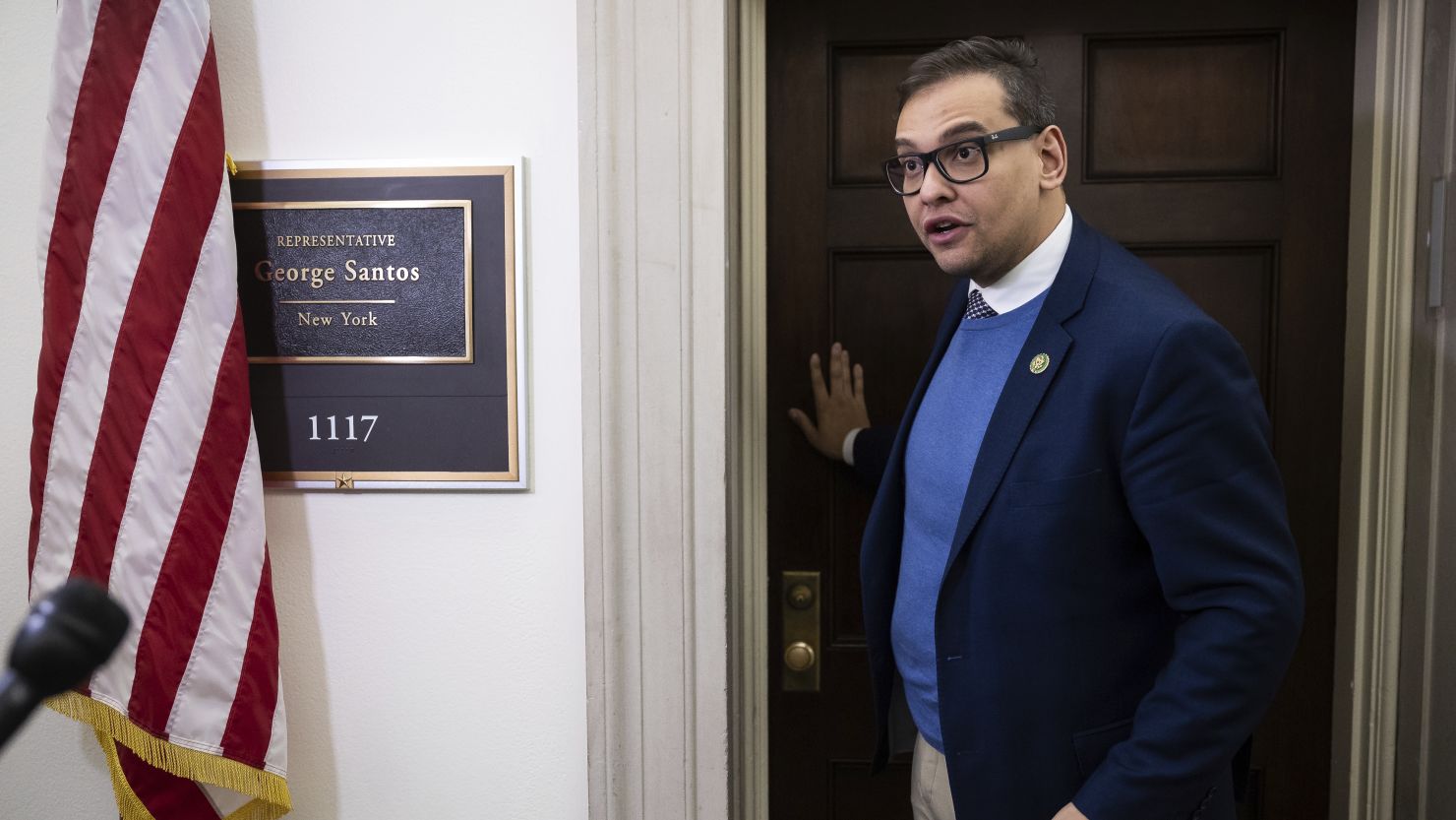 Rep. George Santos speaks with journalists outside his office on Capitol Hill on January 26, 2023. 