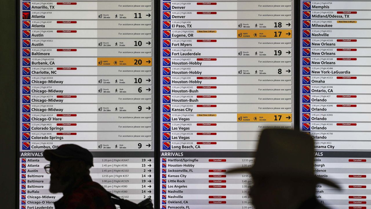Canceled Southwest flights are displayed at Dallas Love Field Airport in Dallas on Monday, Jan. 30, 2023. (Lola Gomez/The Dallas Morning News via AP)
