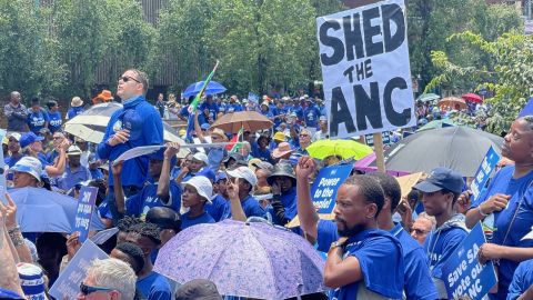 South Africa's opposition party Democratic Alliance protests in front of the headquarters of the ruling ANC against power outages in the country