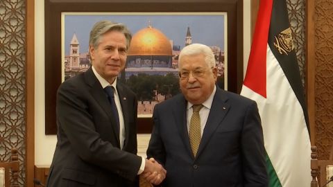 US Secretary of State Antony Blinken and Palestinian Authority President Mahmoud Abbas clasp hands in Ramallah on Tuesday, January 31, 2023.