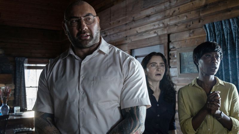 NextImg:'Knock at the Cabin' opens a suspenseful door to what might be the end of the world | CNN