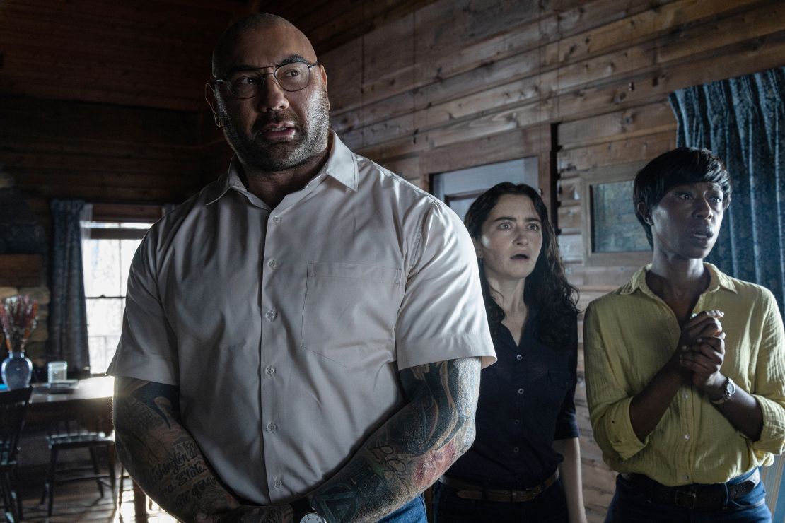 Dave Bautista, Abby Quinn and Nikki Amuka-Bird in director M. Night Shyamalan's adaptation "Knock at the Cabin."