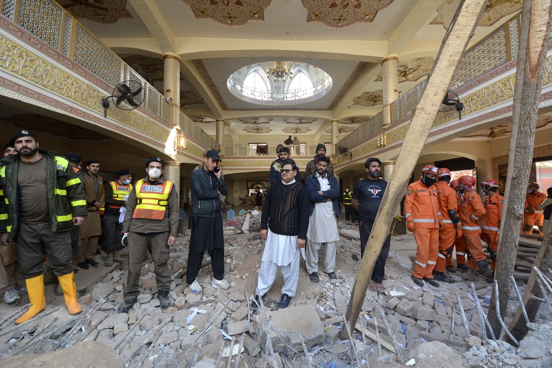 Rescue workers conduct an operation to clear the rubble and search for bodies at the site of the blast on Tuesday.