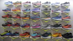 In this Wednesday, Jan. 11, 2017, photo, Hoka One One running shoes are shown at the Outdoor Retailer show, in Salt Lake City. Hoka One One, the latter part pronounced "oh-nay, oh-nay," has carved out a niche in the market by making shoes designed for trail runners that have thick soles meant to give maximum cushion. 