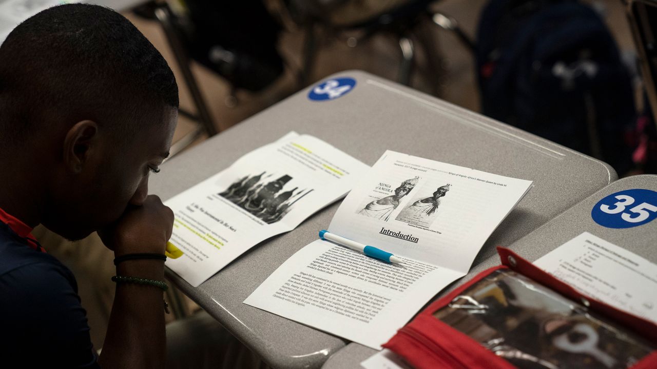 A student in Baltimore looks over his notes during an AP African American Studies course last year.