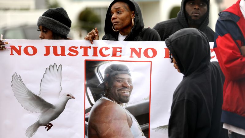NextImg:Double-amputee shot and killed by police; family claims excessive force used | CNN