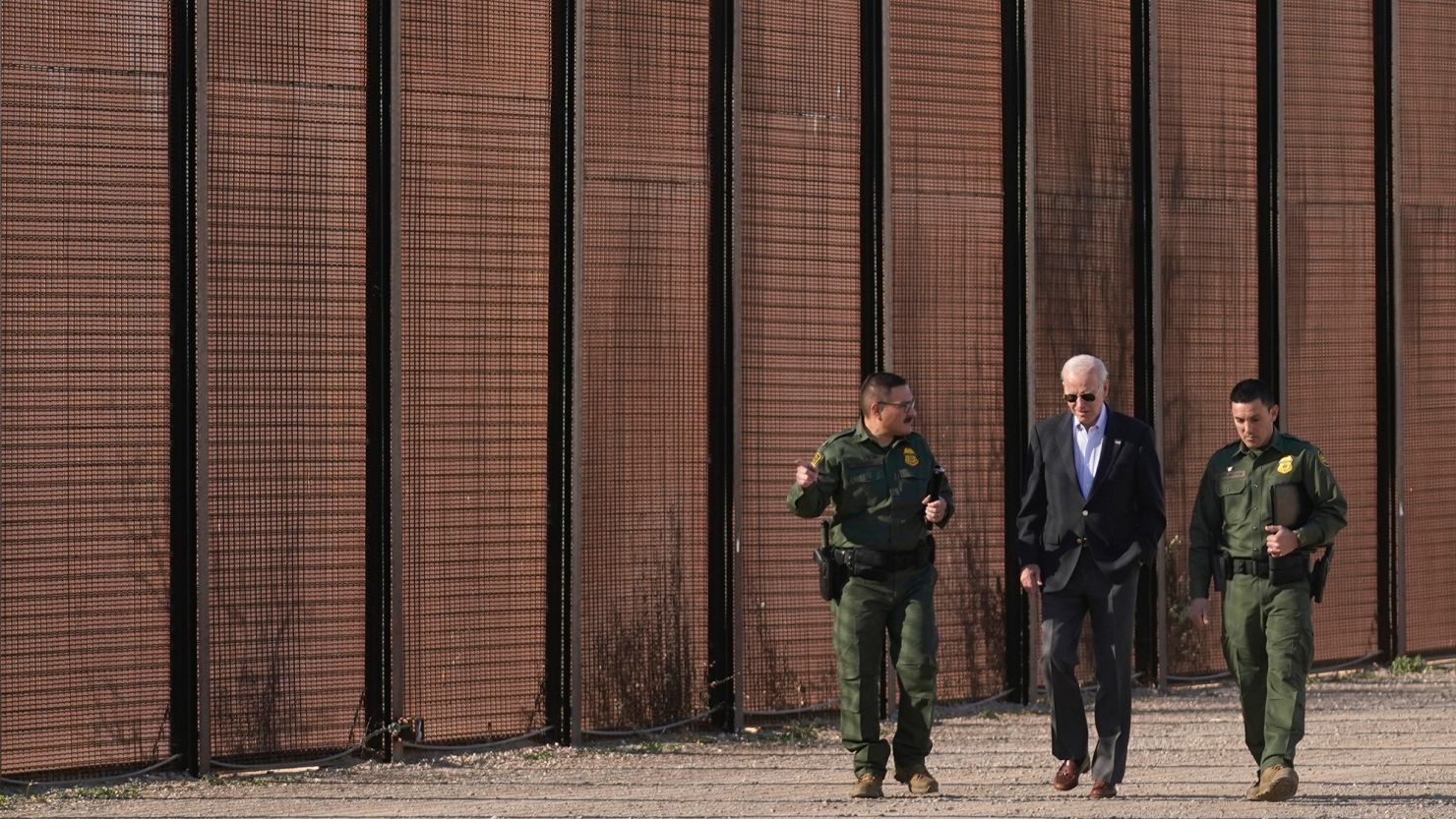 President Joe Biden walks with U.S. Border Patrol agents along a stretch of the U.S.-Mexico border in El Paso, Texas, on Jan. 8, 2023. 
