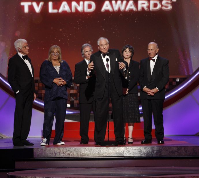 Williams is seen on stage as writer and director Garry Marshall, center, accepts an award at the TV Land Awards in Santa Monica, California, in 2008. Marshall's hits included "Happy Days" and "Laverne & Shirley."