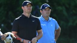 DUBLIN, OHIO - JUNE 03: Rory McIlroy of Northern Ireland and  Patrick Reed of the United States look on from the 15th tree during the second round of the Memorial Tournament presented by Workday at Muirfield Village Golf Club on June 03, 2022 in Dublin, Ohio. (Photo by Sam Greenwood/Getty Images)