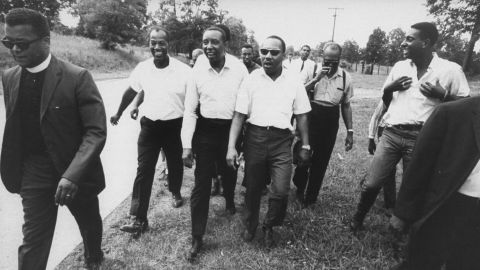 Civil rights leaders Floyd B. McKissick, Dr. Martin Luther King Jr. and Stokely Carmichael during march through Mississippi to encourage voter registration.