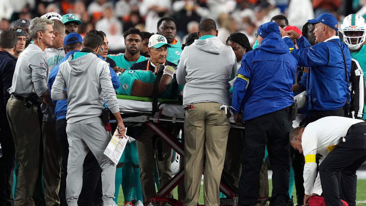 Tua Tagovailoa of the Miami Dolphins is carted off on a stretcher after an injury in a game against the Cincinnati Bengals on September 29, 2022.