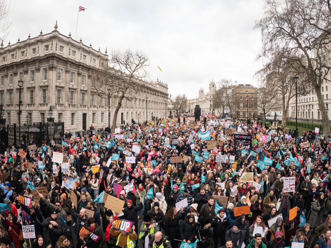 Union members and supporters march towards Westminster, London on February 1, 2023.
