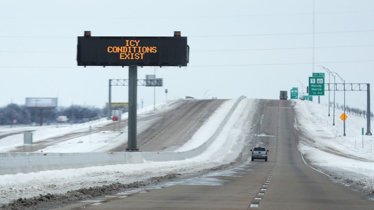 A sign warns of icy conditions on Interstate Highway 35 on February 18, 2021 in Killeen, Texas. 