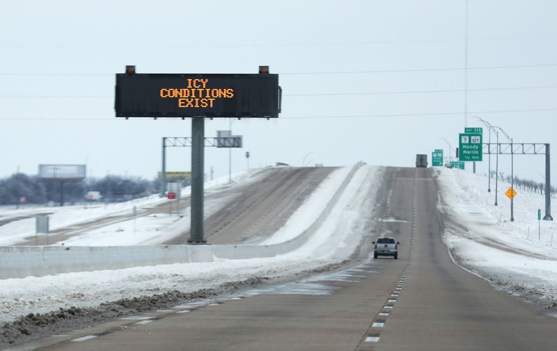 A sign warns of icy conditions on Interstate Highway 35 on February 18, 2021 in Killeen, Texas. 
