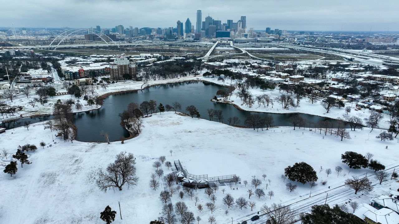 Lake Cliff Park in Dallas is covered with ice and snow Tuesday.