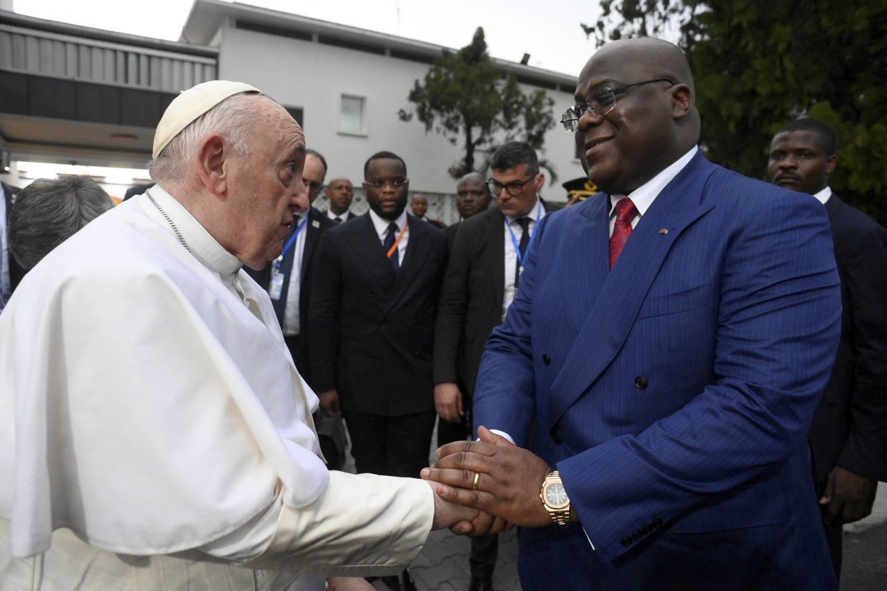Pope Francis shakes hands with President Tshisekedi during the first day of his visit to the DRC.