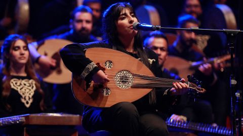 A musician with Iraq's National Band for Musical Heritage performs during a concert marking the 100th anniversary of the death of Iraqi composer Mulla Uthman Al-Mawsili, at the National Theatre in Baghdad on January 30. 