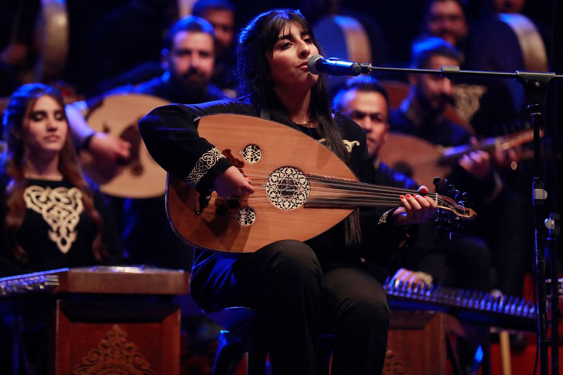A musician with Iraq's National Band for Musical Heritage performs during a concert marking the 100th anniversary of the death of Iraqi composer Mulla Uthman Al-Mawsili, at the National Theatre in Baghdad on January 30. 