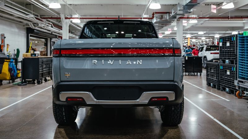 NextImg:EV maker Rivian to cut 6% of jobs amid price war | CNN Business