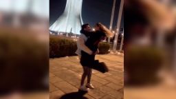 In this still from a video, Astiyazh Haghighi dances without a headscarf with her fiancé Amir Mohammad Ahmadi in Azadi Square in Tehran, Iran.