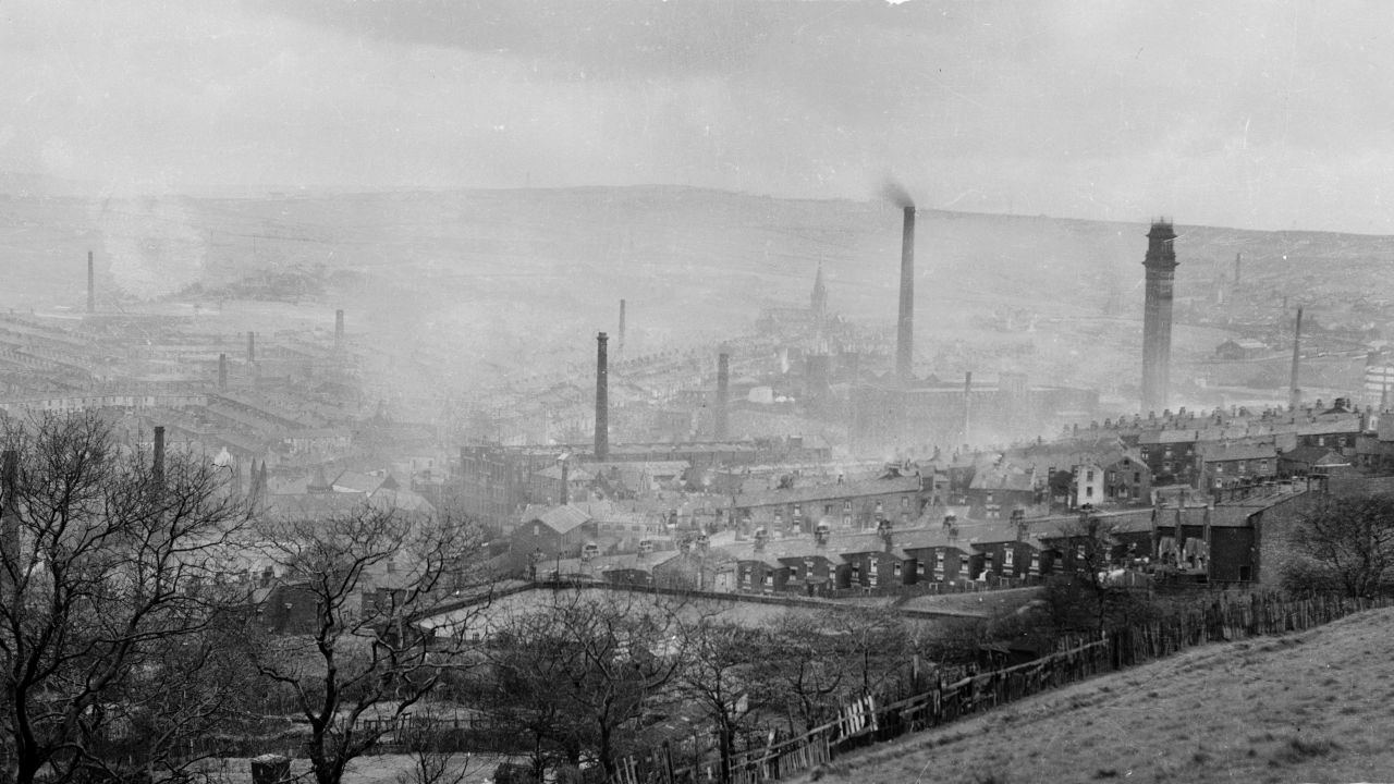 In the 19th century, the Lancashire town of Darwen benefitted from the industrial revolution. It's pictured in 1947, shrouded in smoke from its many chimneys.