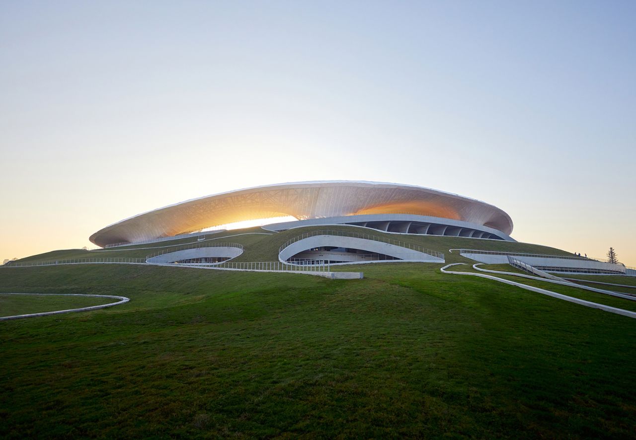 MAD Architects designed Quzhou Stadium, which features integrated green spaces, to mimic mountainous terrain.