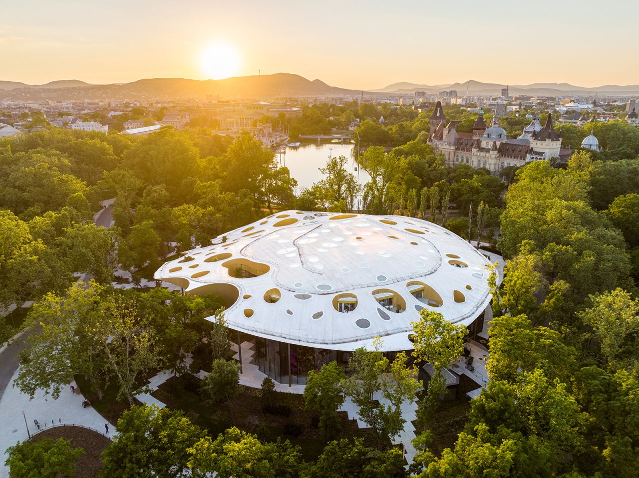 House of Music Hungary in Budapest has a perforated roof that allows for light to shine in and indoor trees to peek out.