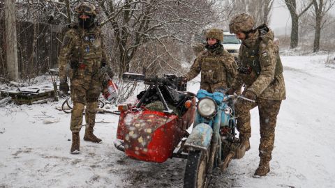 Ukrainian soldiers are pictured in Krasnohorivka on Wednesday, in eastern Ukraine. 