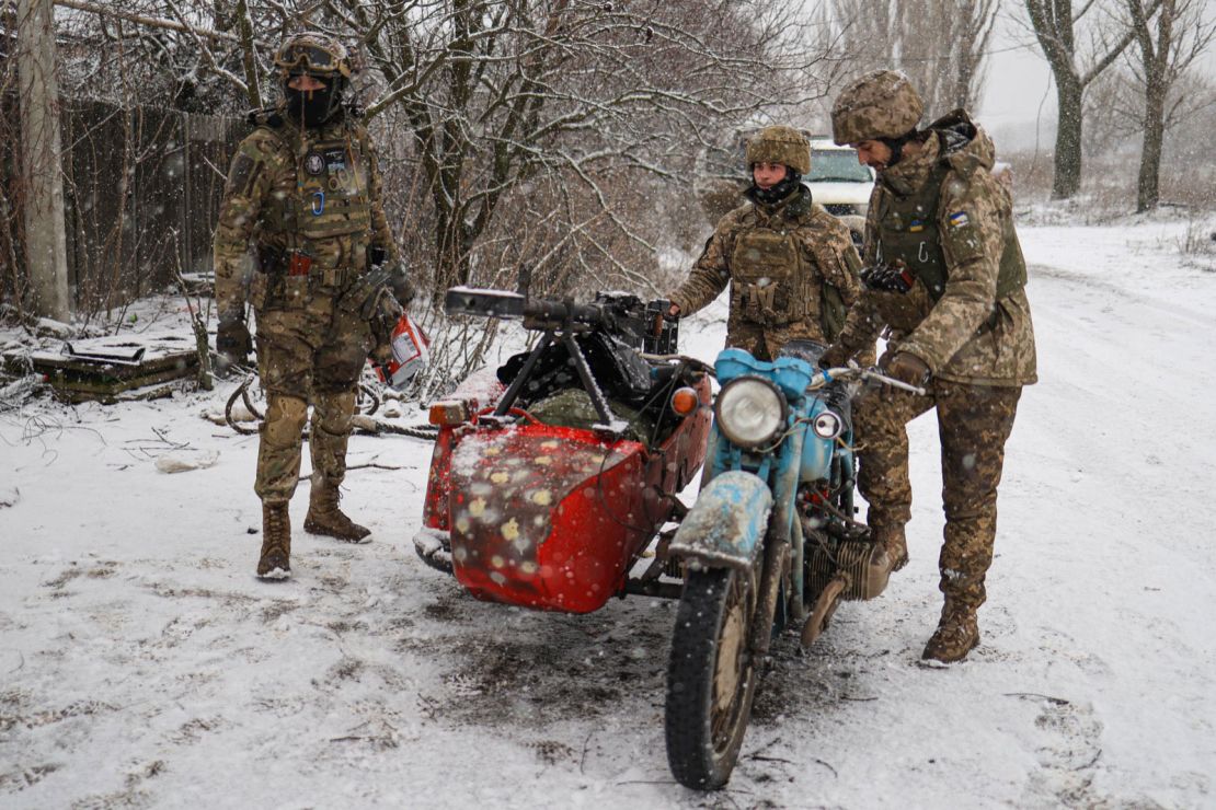 Ukrainian soldiers are pictured in Krasnohorivka on Wednesday, in eastern Ukraine. 
