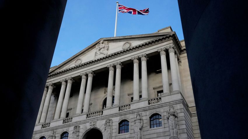 The Union Jack flag waves on top of the Bank of England in London, Thursday, Feb. 2, 2023. The Bank of England is expected to raise interest rates by as much as half a percentage point. That would outpace the latest hike by the U.S. Federal Reserve. The move on Thursday comes as the central bank seeks to tame decades-high inflation that has driven a cost-of-living crisis and predictions of recession.