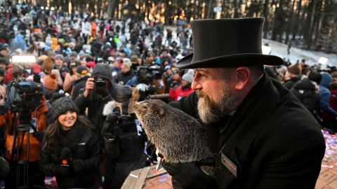 Groundhog Club handler A.J. Dereume holds Punxsutawney Phil during the celebration of Groundhog Day on Thursday in Punxsutawney, Pennsylvania.