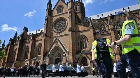 Police officers can be seen outside the Cathedral of St. Mary on Thursday.