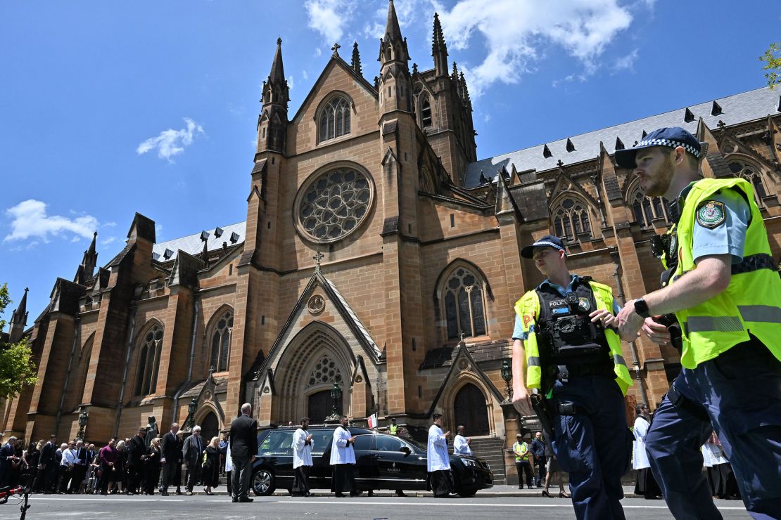 Police officers are seen outside St. Mary's Cathedral on Thursday.