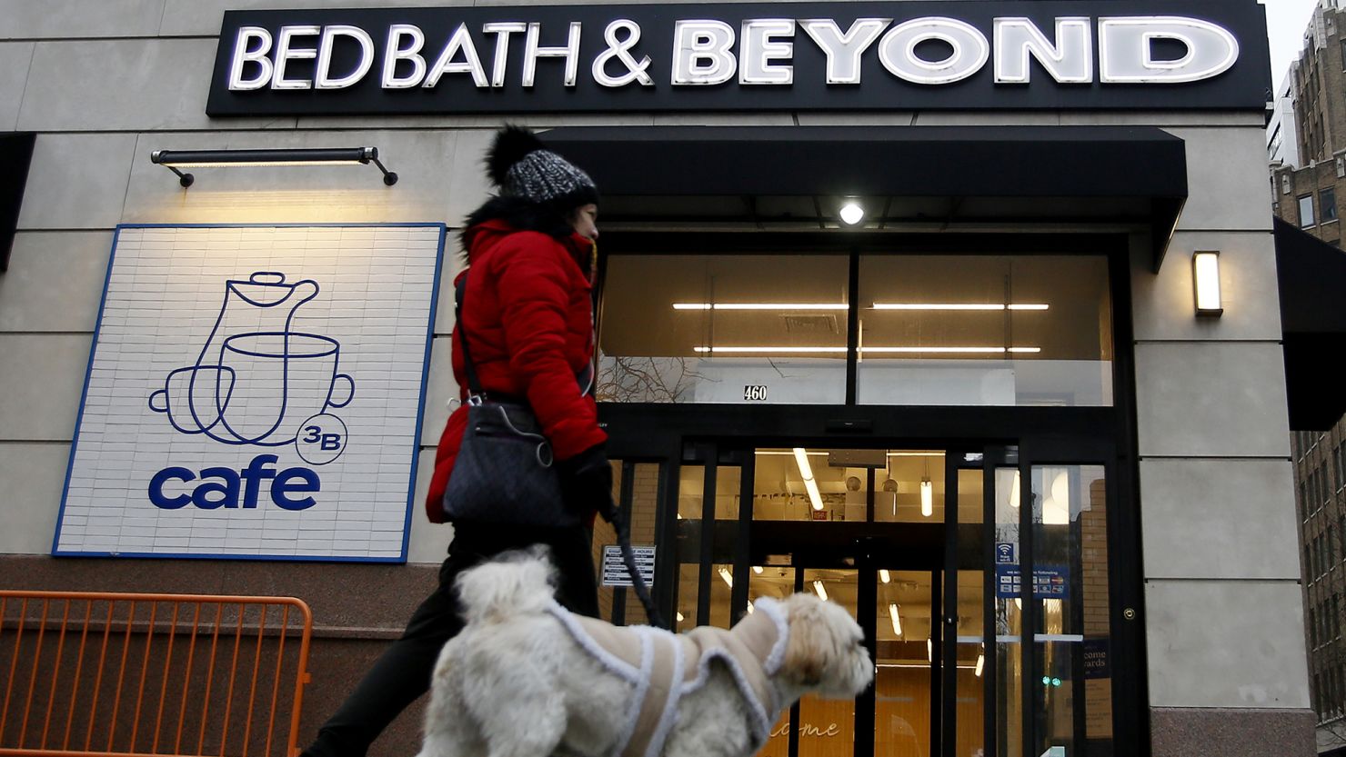 A woman walks her dog near a Bed Bath & Beyond branch on January 11, 2023 in New York City.