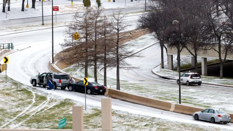 Vehicles get stuck on an exit ramp of US 75 in Dallas on Wednesday.