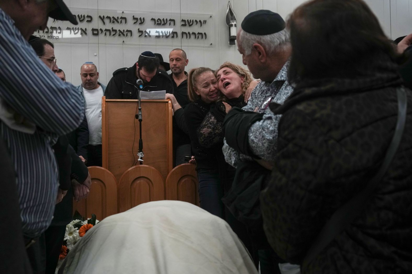 Mourners attend the funeral of Rafael Ben Eliyahu, a victim of a <a href="index.php?page=&url=https%3A%2F%2Fwww.cnn.com%2F2023%2F01%2F27%2Fmiddleeast%2Fjerusalem-shooting-dead-intl%2Findex.html" target="_blank">shooting attack in Jerusalem</a>, on Sunday, January 29. Israeli police say seven people were killed and three injured when a Palestinian gunman opened fire near a synagogue on Friday, January 27. It came amid high tensions in Israel and the Palestinian territories. The day before, Israeli forces killed nine Palestinians and wounded several others in the West Bank city of Jenin, according to the Palestinian Ministry of Health.