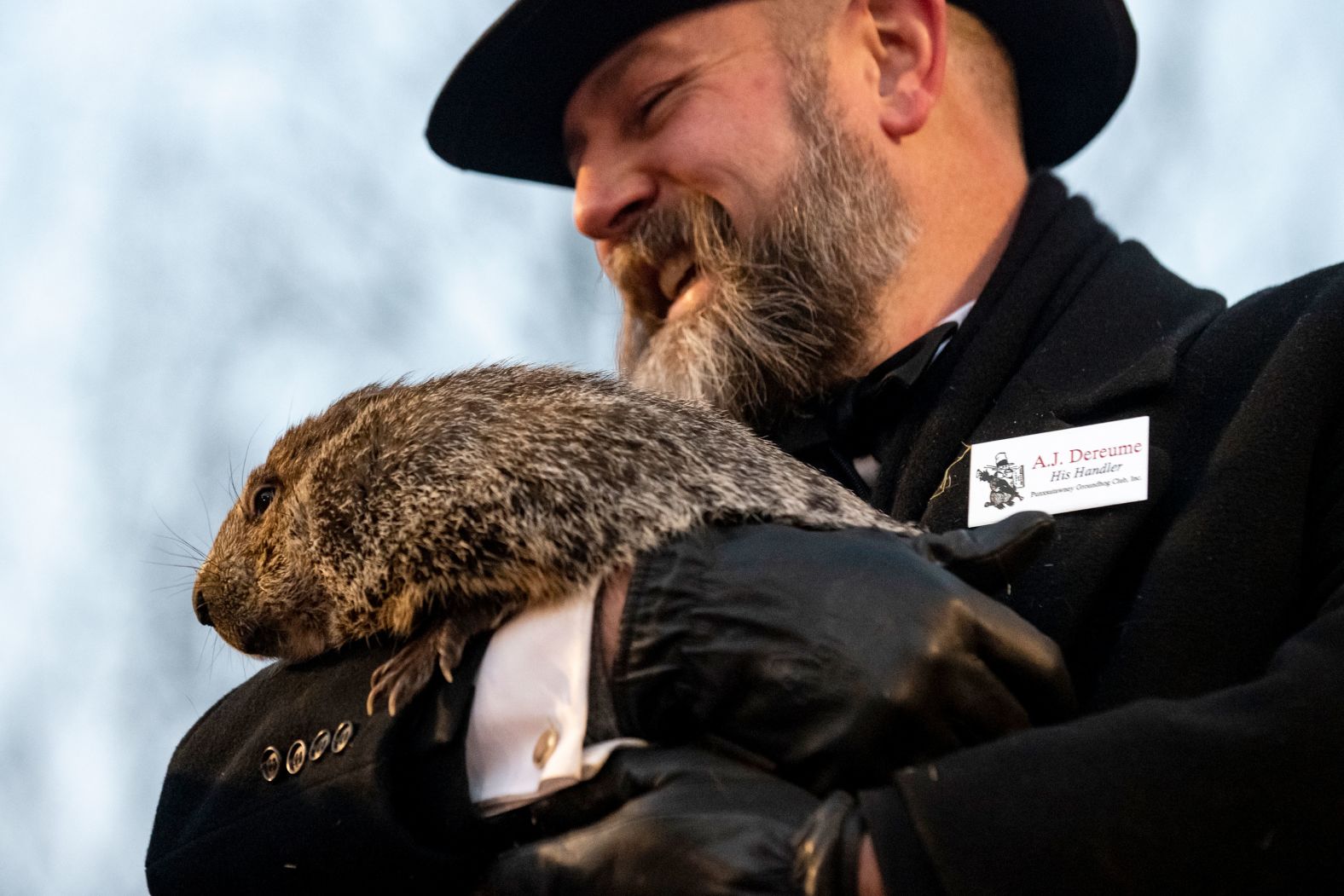 Groundhog handler AJ Dereume holds Punxsutawney Phil, the legendary groundhog weather watcher, during Groundhog Day festivities in Punxsutawney, Pennsylvania, on Thursday, February 2. <a href="index.php?page=&url=https%3A%2F%2Fwww.cnn.com%2F2023%2F02%2F02%2Fus%2Fgroundhog-day-punxsutawney-phil-2023-trnd%2Findex.html" target="_blank">Phil woke up and saw his shadow Thursday morning</a>, calling for six more weeks of winter.