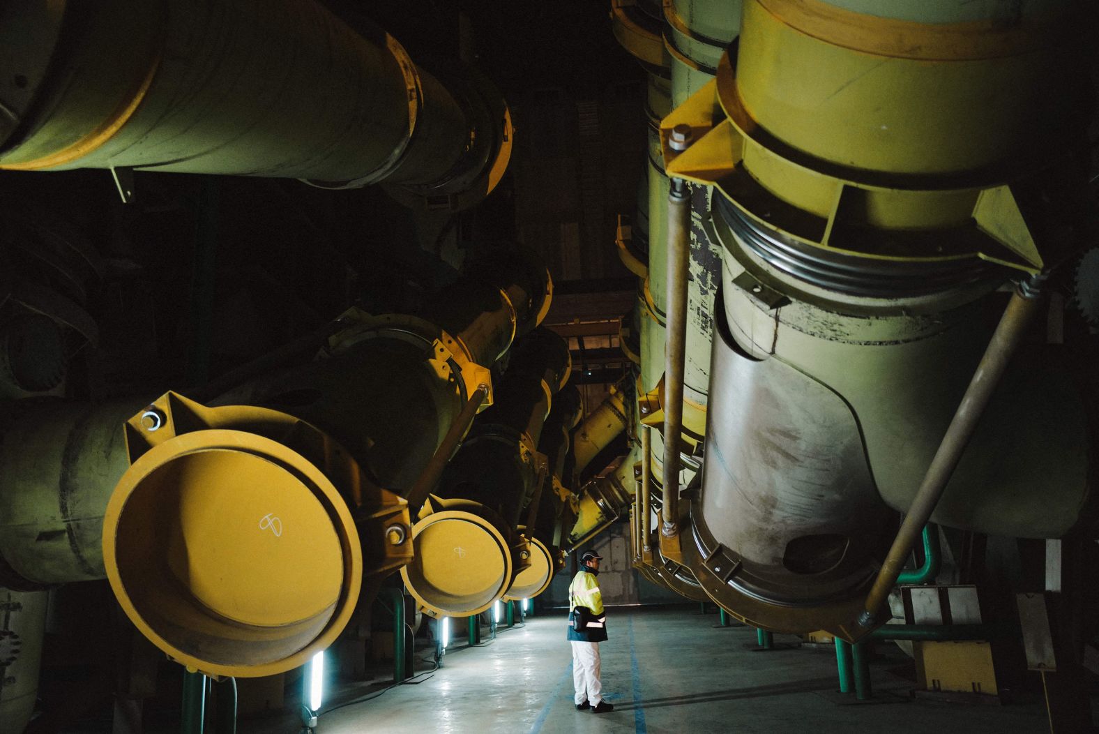 An employee stands in the manufacturing workshop Georges Besse 1, a uranium enrichment site at a nuclear power plant in Saint-Paul-Trois-Châteaux, France, on Thursday, January 26.