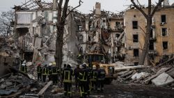 TOPSHOT - Firefighters work among debris of a destroyed building by a rocket strike in Kramatorsk on February 2, 2023, amid the Russian invasion of Ukraine. - At least three people were killed on February 2, 2023 and 20 wounded when a Russian rocket struck a residential building in the centre of Kramatorsk, located in Ukraine's eastern industrial region of Donetsk. (Photo by YASUYOSHI CHIBA / AFP) (Photo by YASUYOSHI CHIBA/AFP via Getty Images)