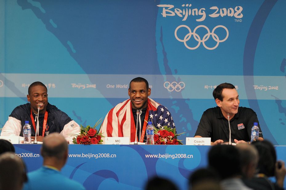 James, seen here between Dwyane Wade and head coach Mike Krzyzewski, returned to the Olympics in August 2008 as part of the "Redeem Team" that went on to win gold.