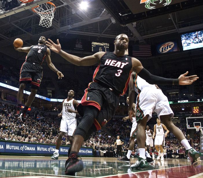 Wade reacts as James dunks the ball during a game in Milwaukee in December 2010. They made the NBA Finals in their first season together but lost to Dirk Nowitzki and the Dallas Mavericks.