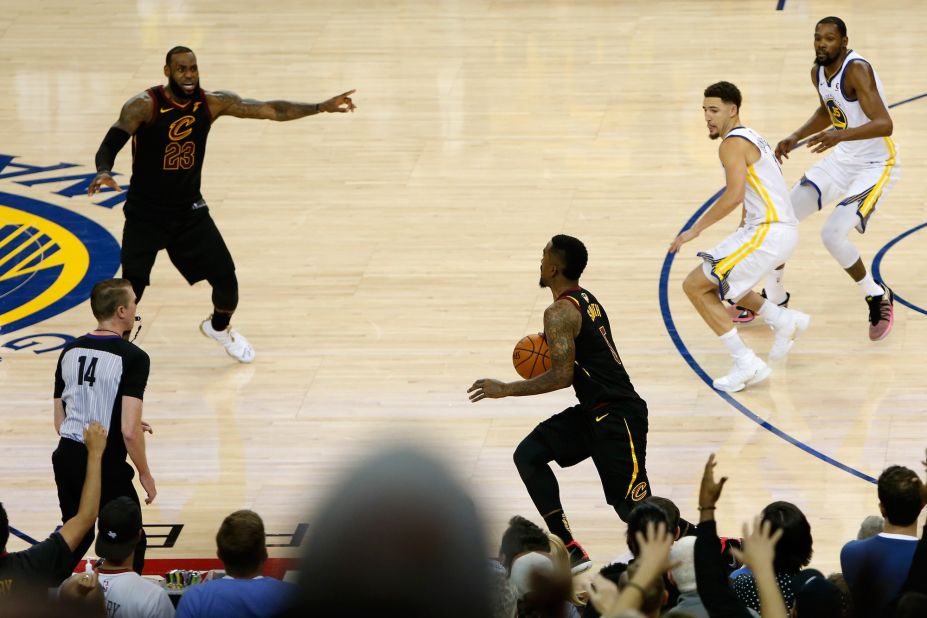 James tries to direct teammate J.R. Smith on a last-second play in the 2018 NBA Finals. The Cavaliers and the Warriors played in four straight NBA Finals, from 2015 to 2018. The Warriors won three of the four.