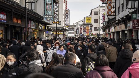 Shoppers in a shopping area on Guangqian Street in Suzhou, Jiangsu province, January 25, 2023. 