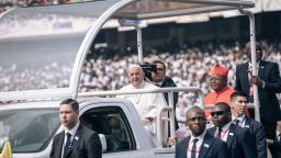 Pope Francis (C)arrives by popemobile for a meeting with young people and catechists at Martyrs' Stadium in Kinshasa, Democratic Republic of Congo (DRC), on February 2, 2023. - Pope Francis is set to address thousands of youngsters in Democratic Republic of Congo on February 2, 2023 after holding an open-air mass that drew an estimated million faithful, as he pursues a landmark trip to central Africa. (Photo by ALEXIS HUGUET / AFP) (Photo by ALEXIS HUGUET/AFP via Getty Images)