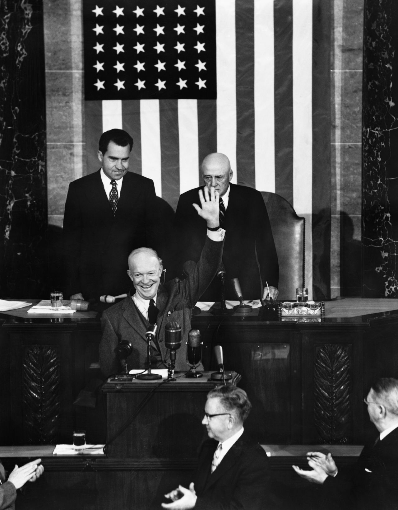 President Dwight Eisenhower acknowledges applause from the Democratic-controlled Congress before delivering his State of the Union address in 1955. 