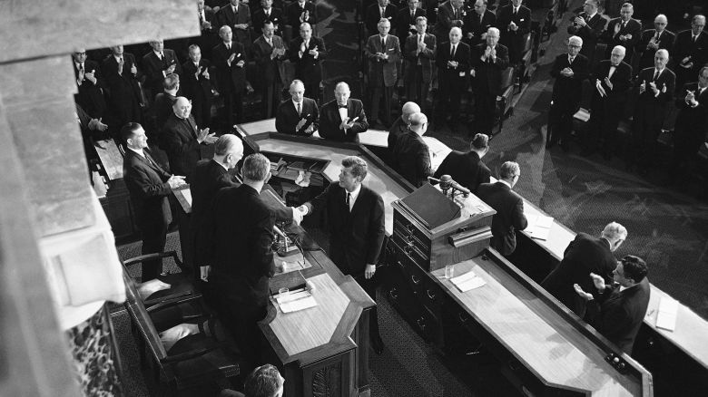 President Kennedy shakes hands with House Speaker John McCormack, D-Mass., on Jan. 11, 1962 in Washington after delivering his State of the Union address to a joint session of the 87th Congress in the House chamber. Beside McCormack is Vice President Lyndon Johnson. (AP Photo)